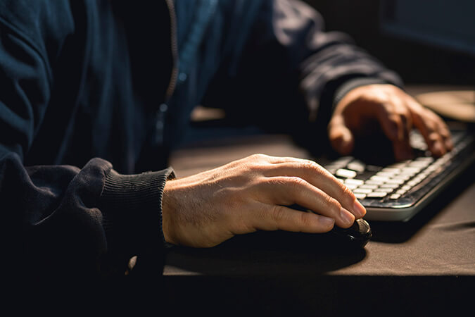 man on computer